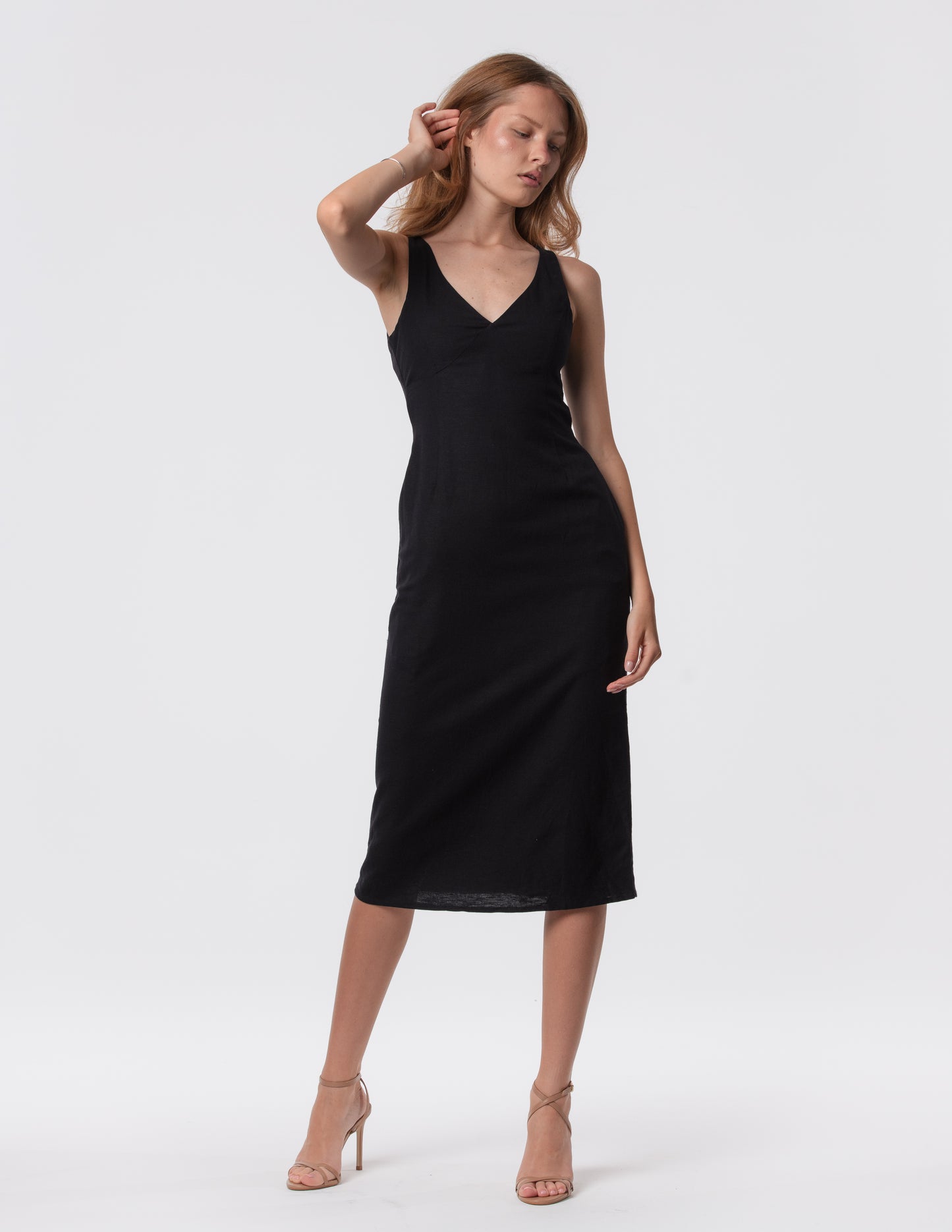 The Everyday Midi Dress in black by Artemizelle, front view