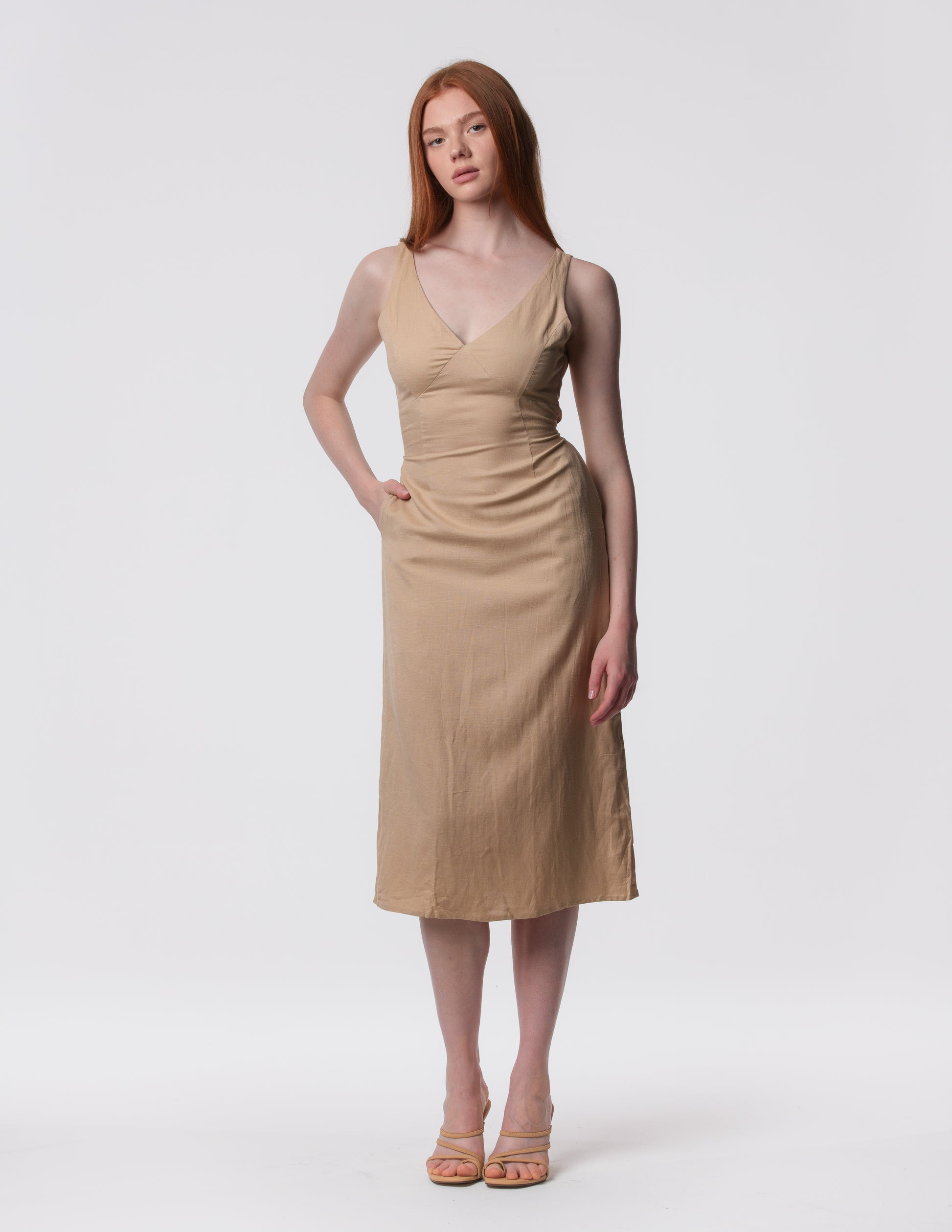 The Everyday Midi Dress in beige by Artemizelle, front view, side pocket