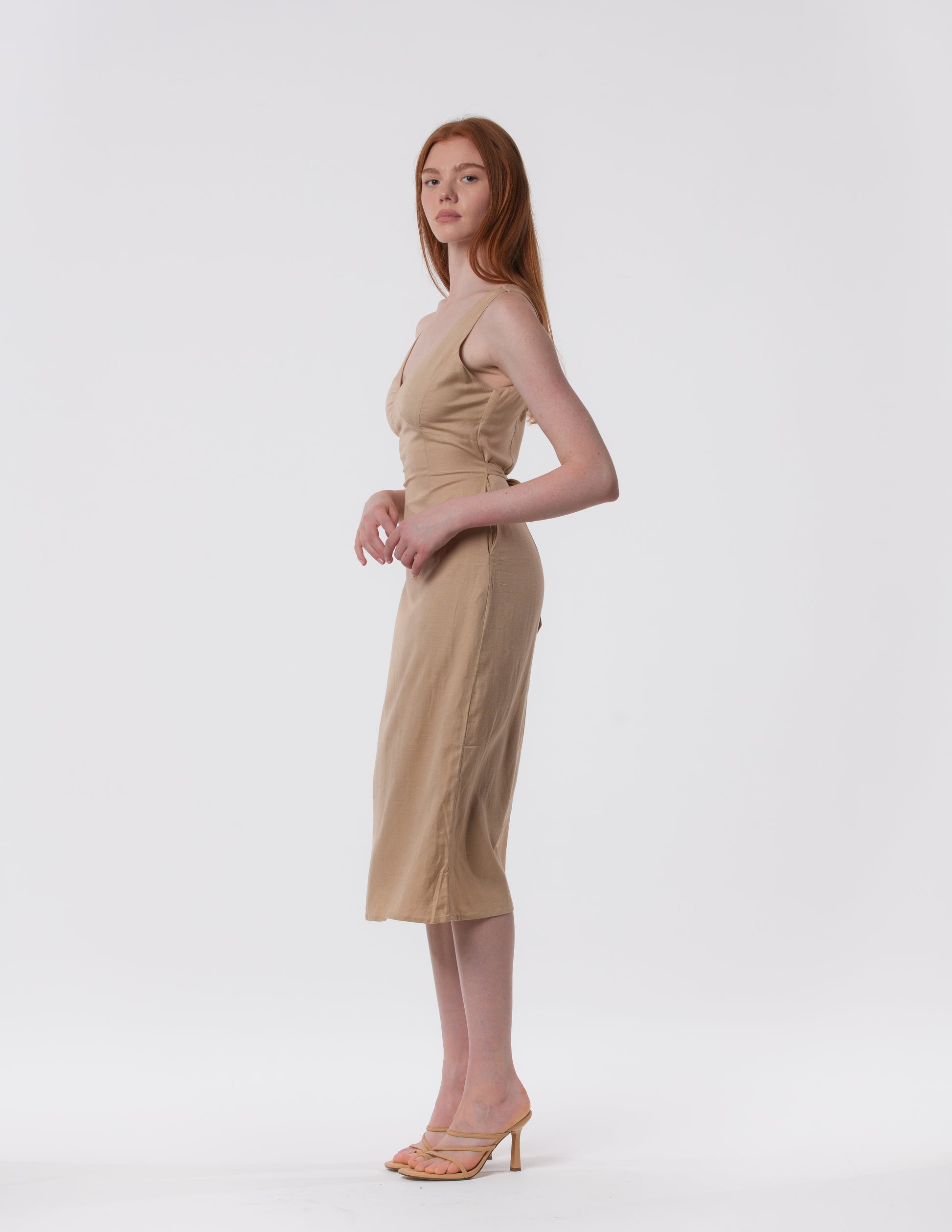 Beige v-neck linen blend midi dress by Artemizelle, side view